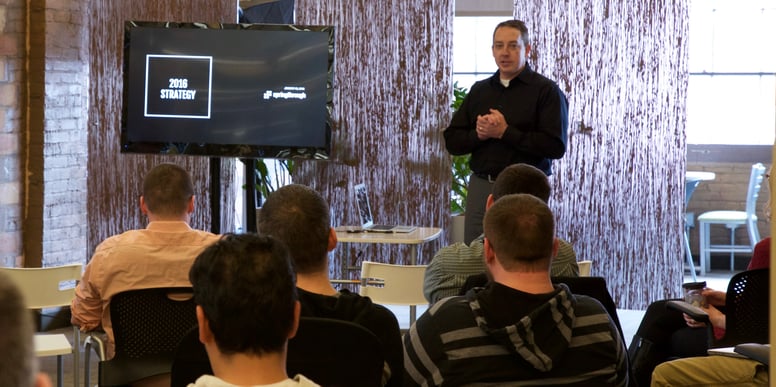 Jeff Williams presenting "2016 Strategy" to team